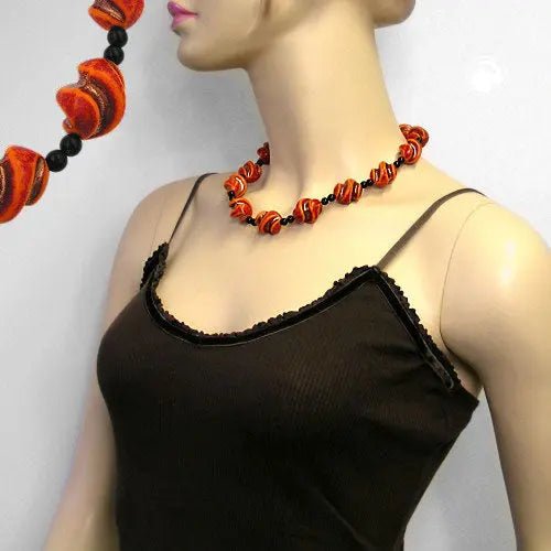 Kette Kunststoffperlen Schraubenperlen rot - orange schwarz 50cm