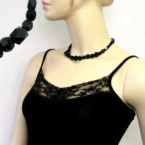 Kette Perlen Kunststoff schwarz - glänzend facettiert 42cm