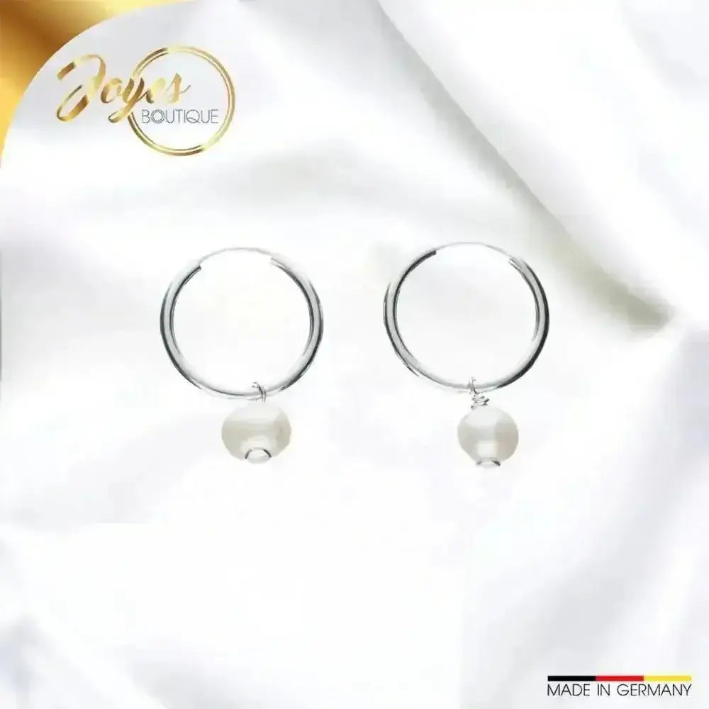 Wie trägt man Creolen Ohrstecker in Silber - Joyes Boutique