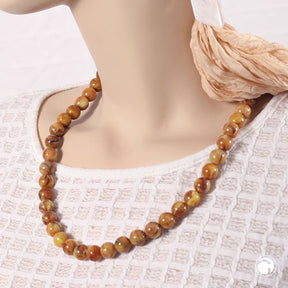 Kette 12mm Rundperle braun - gelb - marmoriert Kunststoff